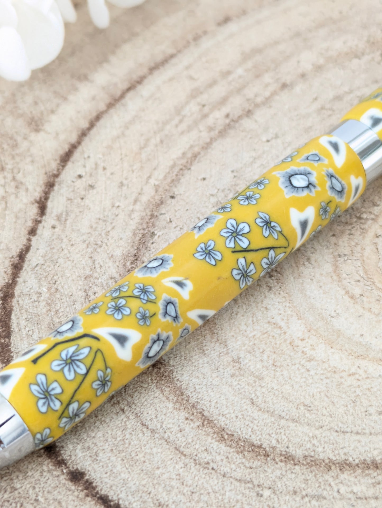 Stylo bille fleuri jaune