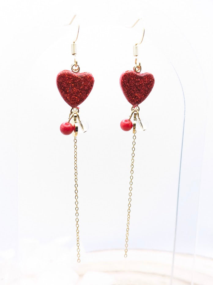 Boucles d'oreilles cœurs rouge à paillettes