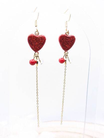 Boucles d'oreilles cœurs rouge à paillettes